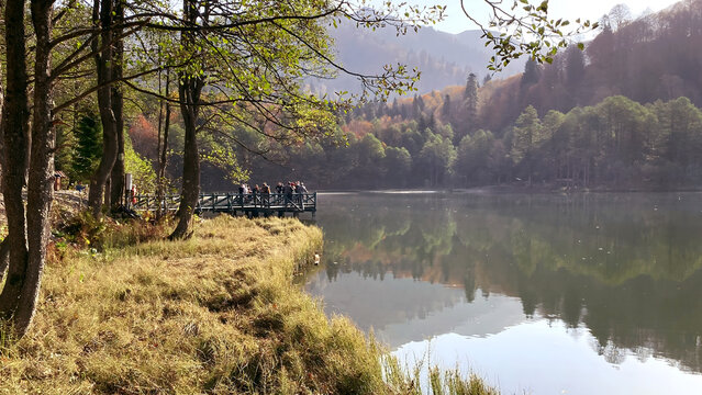 Karag&ouml;l, Bor&ccedil;ka, Artvin, Turkey - 14 October 2021. Autumn view from Karag&ouml;l in Bor&ccedil;ka district of Artvin province. Borcka Karagol Nature Park. The forest scene reflected in the still lake.