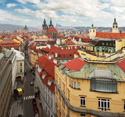 Scenic sight of the historical center of Prague, Czech Republic from a bird’s eye view. Buildings and landmarks of old town with red rooftops and multi-colored walls