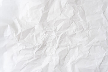 Top view and full frame of white wrinkled or crumpled stencil paper background texture used for crumpled paper background texture in decorative art work