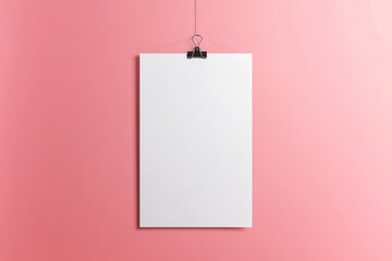 Blank White Poster Hanging on a Pink Wall