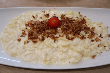 German cuisine: käsespätzle in Munich, Germany