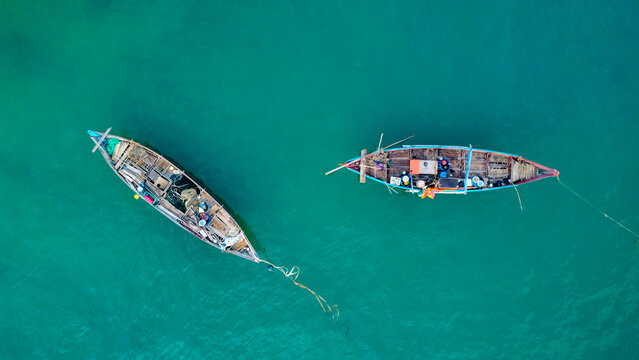 A fishing village with it&acute;s traditional basket boats in Vietnam, Asia, seen from above