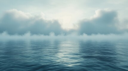 Obraz premium A tranquil scene of a vast body of water with a misty horizon and soft, ethereal clouds. The water reflects the soft light of the sky.