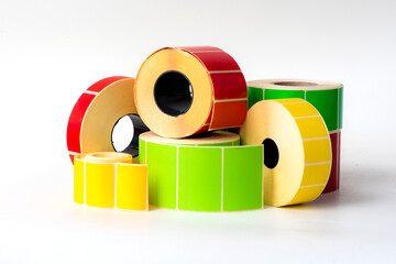 Rolls of paper stickers for printing information on a printer.