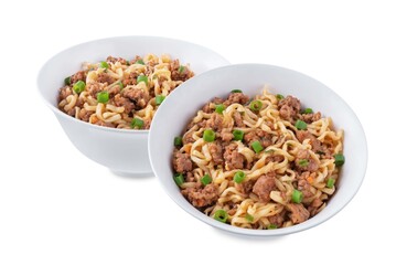 Ground meat spicy ramen noodles in a bowl on a white isolated background