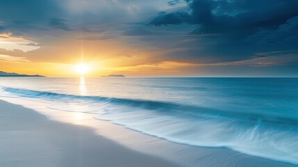 Obraz premium Serene Sunset Beach Scene with Seagull in Distance