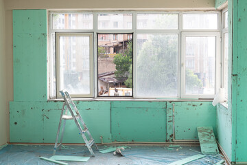 Indoor thermal insulation materials mounted on the wall of a room. XPS (Extruded Polystyrene)...