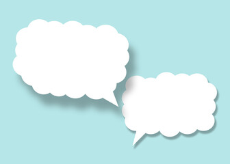 Empty white cloud paper speech bubble shape against light blue background.