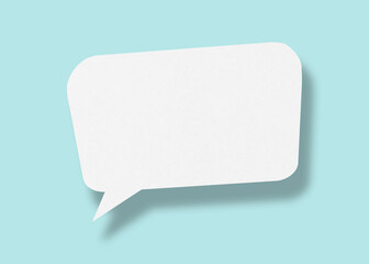 Empty speech balloon shape white paper isolated on light blue background communication bubbles.