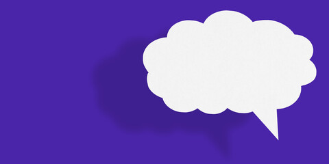 Empty white cloud paper speech bubble shape against blue background.