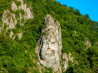 Colossal rock carving of King Decebalus  (AD 87–106) on the shores of the Danube river,  Orșova,...