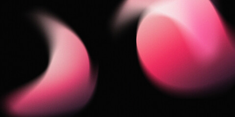Abstract blurred gradient on black background with grainy texture.