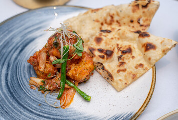 Prawn curry with naan bread 