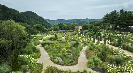 Wigok-ri, Gapyeong-gun, Gyeonggi-do, South Korea - August 19, 2022: High angle view of trail and trees at the garden of The Stay Healing Park in summer © JinChang