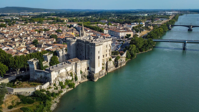Magnificent medieval castle in Tarascon, a French town located in the Bouches-du-Rhone department of the Provence-Alpes-C&ocirc;te d'Azur. City of Tarascon seen from a drone, tourist travel destination.