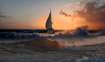 Yacht sailing in open sea at stormy day - Anchored sailing yacht on calm sea with tropical storm 
