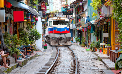 Hanoi city railway Perspective view running along narrow street with houses in Vietnam