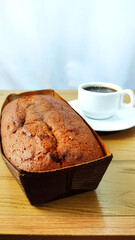 Cinnamon cake and cup of coffee on the breakfast  table
