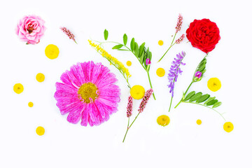 summer wild flowers on white fabric. background. flower arrangement.