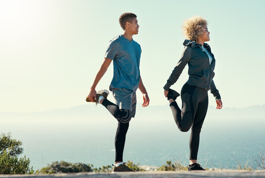 Smile, stretching and warm up with couple and fitness training for health, workout and goals in outdoor. Prepare, blue sky and partnership with man and woman for exercise, wellness and sports break