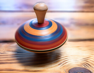 Handmade wooden spinning top in motion