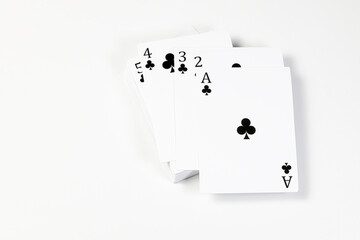 Flying playing card for poker and gambling,  top with A clubs - isolated on white background.
