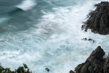 waves crashing on rocks