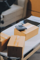 Small business owners couple entrepreneurs working with parcel, e-business, marketing, online shop, sme, entrepreneurs