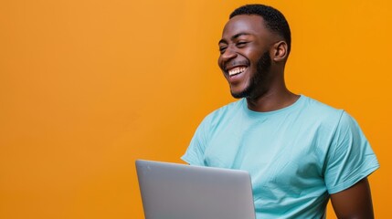 The smiling man with laptop