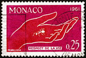 Postage stamp Monaco 1961 hand and ant, respect for life