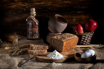 Sliced ​​fresh rye bread on a rustic table
