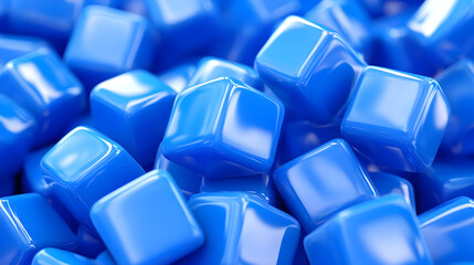 A close-up of shiny blue cubes scattered together.