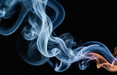 Fototapeta premium Colourful smoke on dark background.