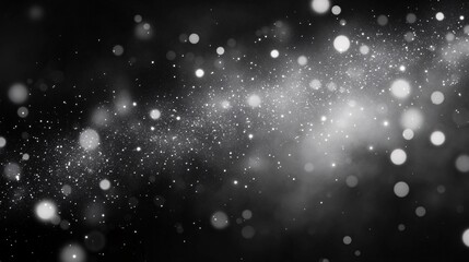 Fototapeta premium A sophisticated abstract background that evokes the feeling of a starry night sky. The design features a dark, almost black background with small, twinkling dots of light scattered throughout. The