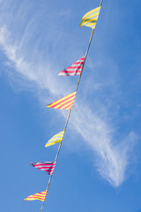 Colourful bunting against a blue sky