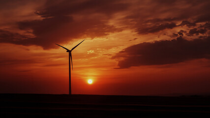 Obraz premium Moderne Windkraftanlage symbolisiert saubere Energie und Umweltschutz. Ideal für Themen wie erneuerbare Energien und Nachhaltigkeit