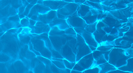 Swimming pool blue water abstract  background texture.Summer vacation or relax concept.Selective focus.