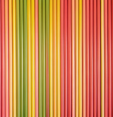 Obraz premium A vibrant gradient background featuring vertical lines in green and yellow hues. Perfect for abstract themes and creative projects seeking colorful and dynamic aesthetics.