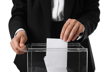 Woman putting her vote into ballot box against white background, closeup