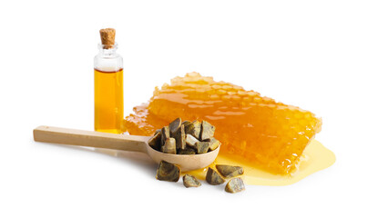 Natural honey tincture, propolis granules and sweet honeycombs isolated on white