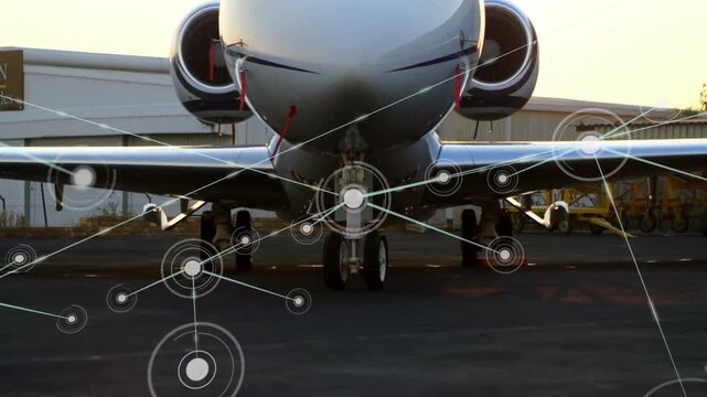 Network of connections and data processing animation over airplane on tarmac