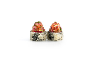 Two gourmet sushi pieces on a simple white background