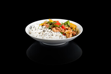 Exquisite Asian food in a white bowl on a black background