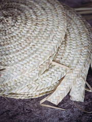 Detailed craftsmanship in weaving Palmito baskets