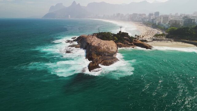 Aerial view approaching the Pedra do Pontal, hazy day in Rio de Janeiro, Brazil