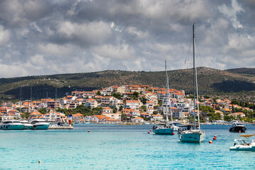 Rain clouds gathering over small town of Rogoznica, Croatia, famous nautical destination in central Dalmatia