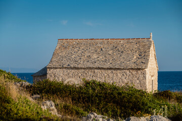 St. John of Trogir chapel, built on the shore of Punta Planka, the most exposed piece of croatian...
