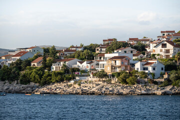 Small, dense built apartment houses at the small village of Razanj, Croatia, next to the sea