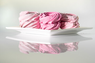 Sweet dessert  zephyr. Marshmallows isolated on white background