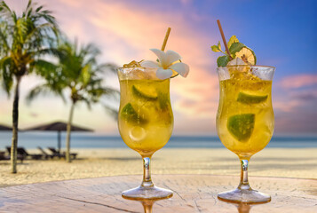 Two drinks with decoration on a tropical beach